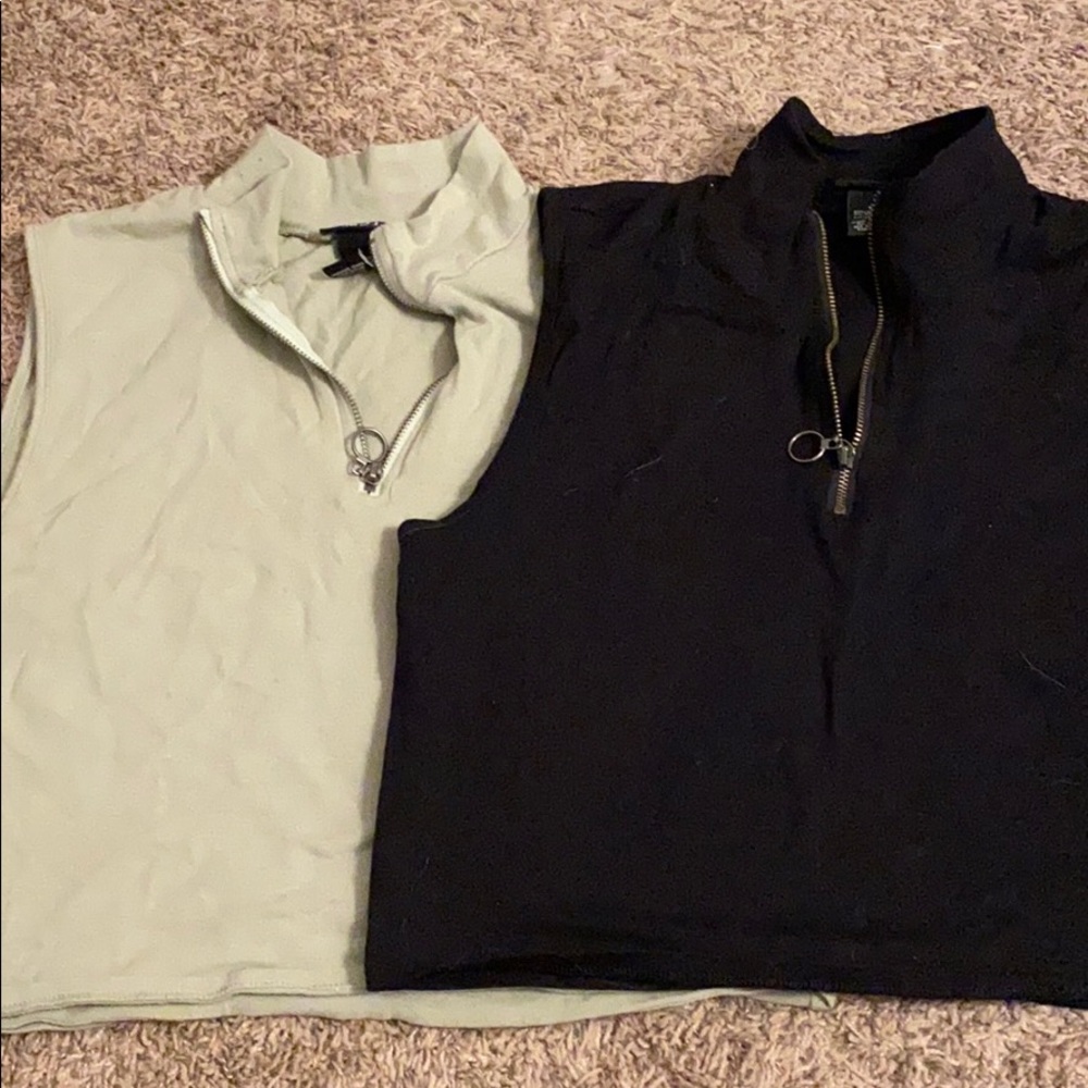 TWO zip crop tops